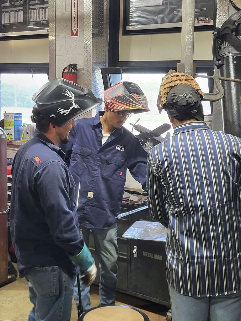 ACE Academy welding students work alongside students from Hawaii.