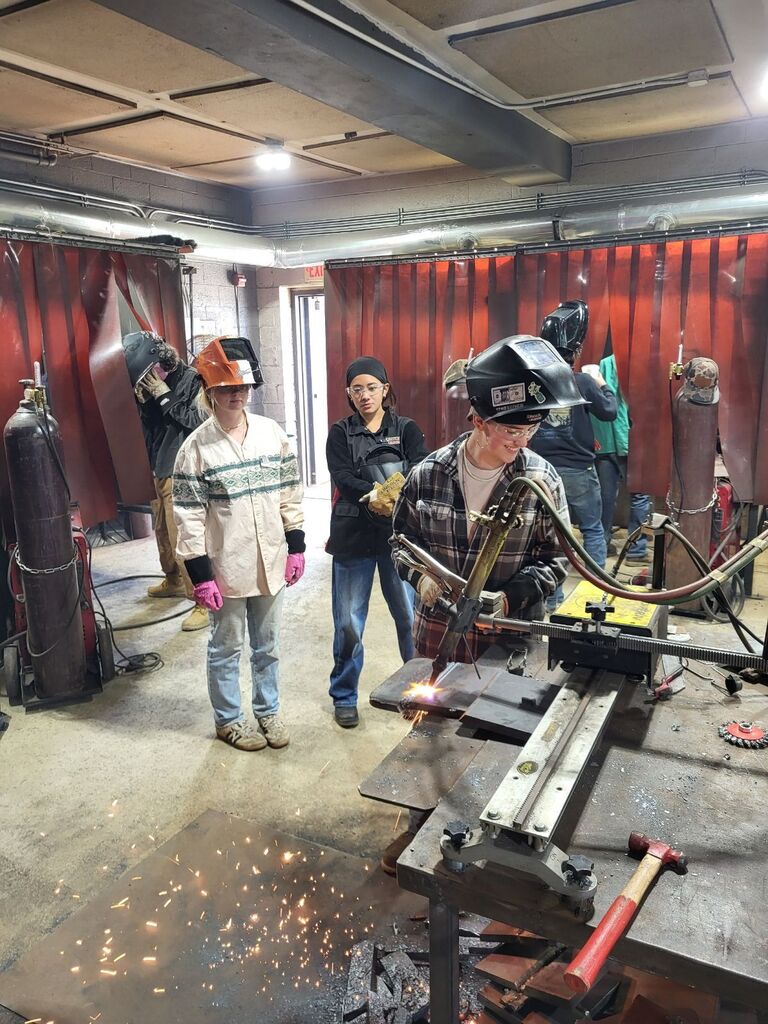 ACE Academy welding students work alongside students from Hawaii.