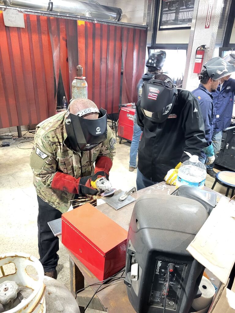 ACE Academy welding students work alongside students from Hawaii.