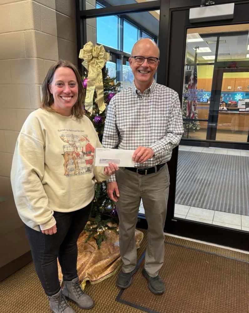 Mrs. Maag(Elementary Principal) and Chris Bowers (Ada Food Pantry representative)