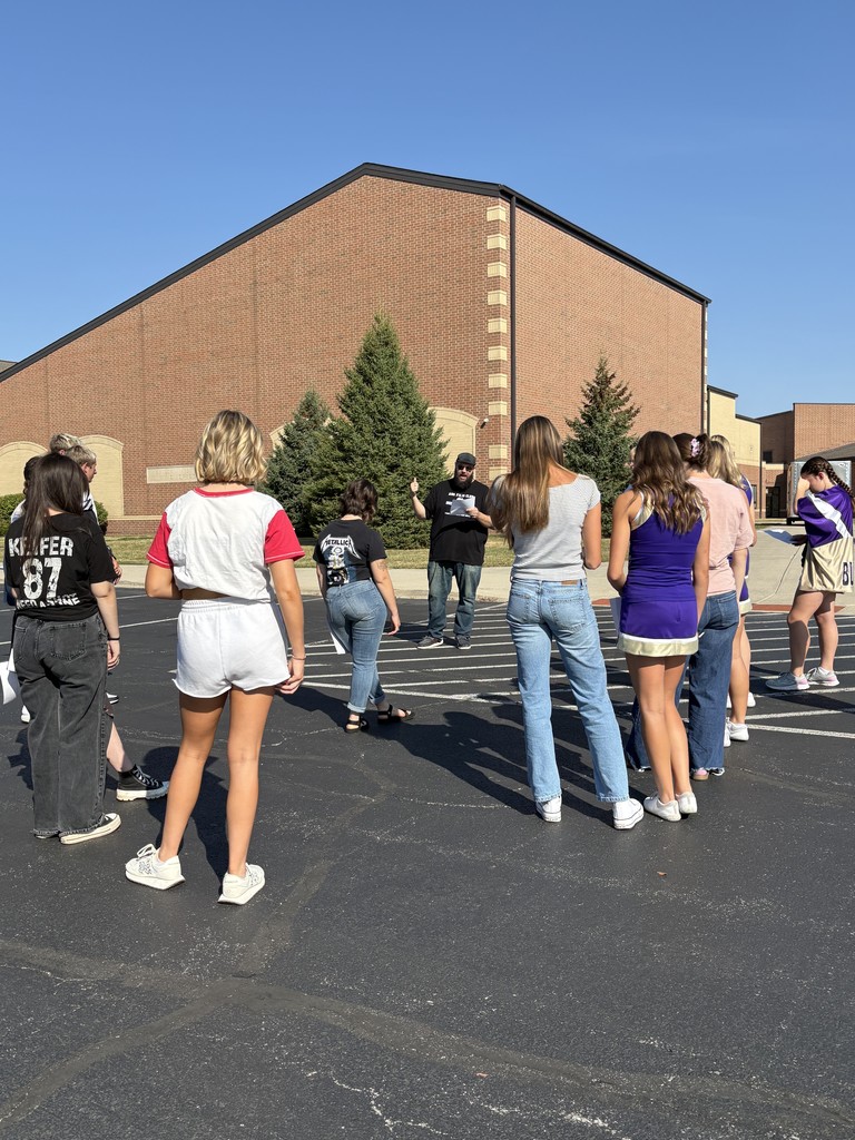 Students learning poetry outside