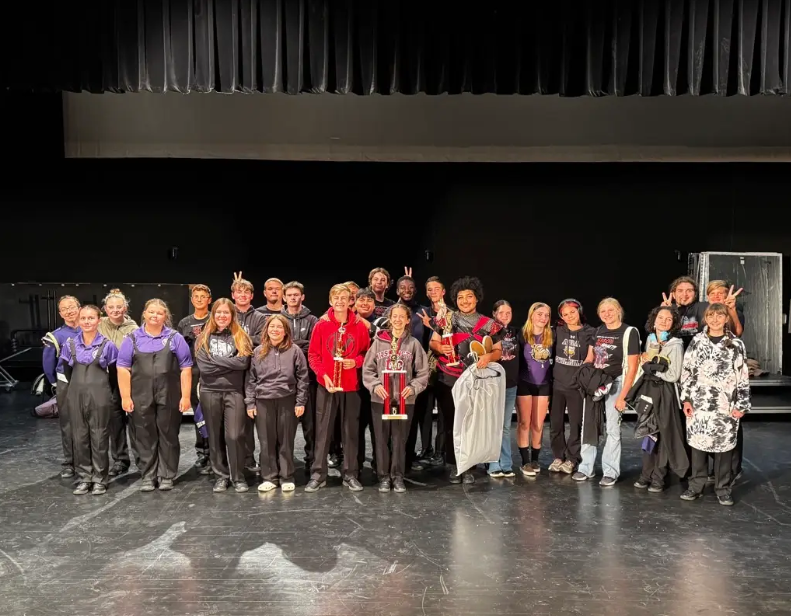 Members of the Ada  band with their trophies after the first competition this year.