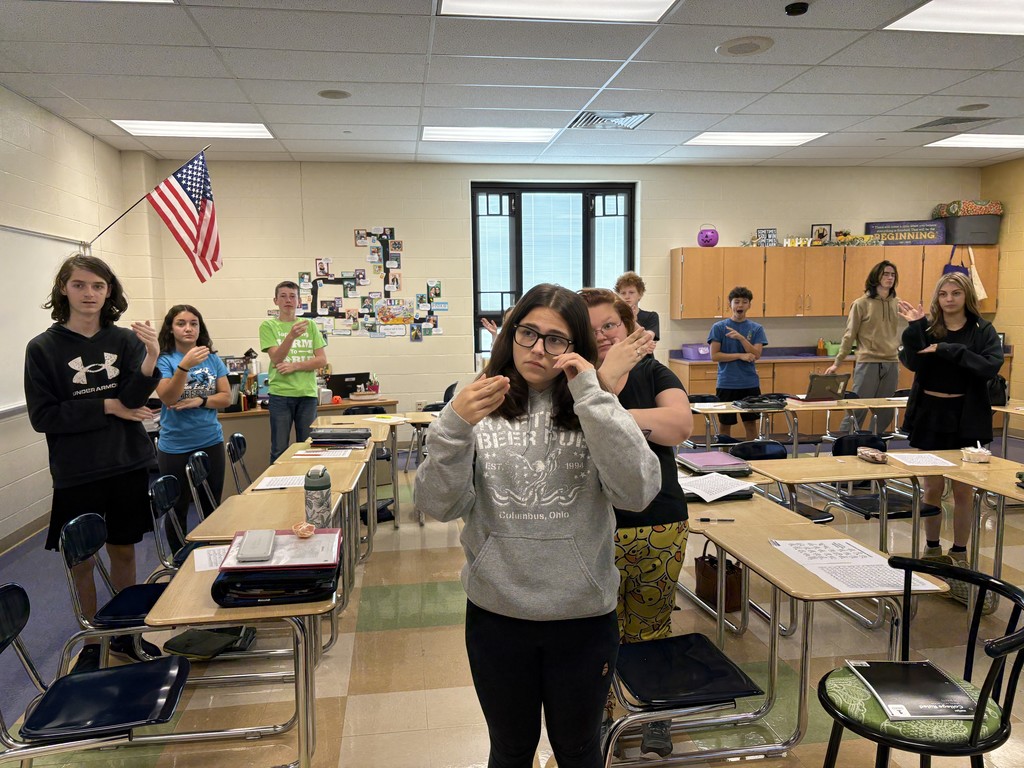 ASL Student Signing the pledge