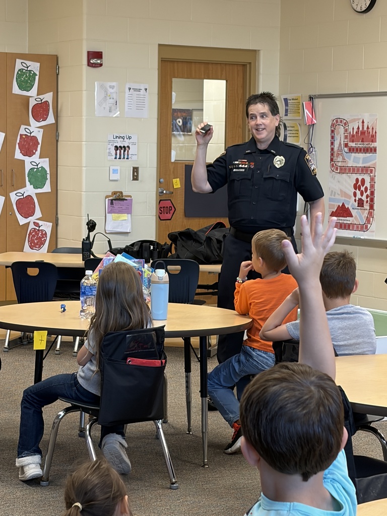Officer Penny speaking to a class