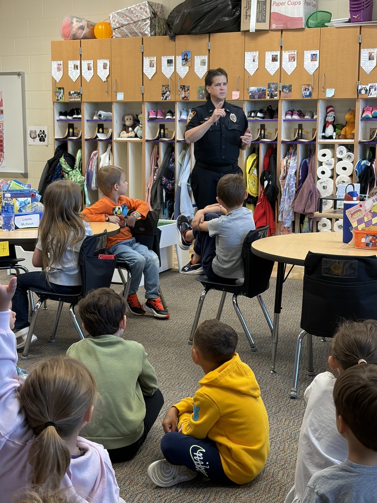 Officer Penny speaking to a class