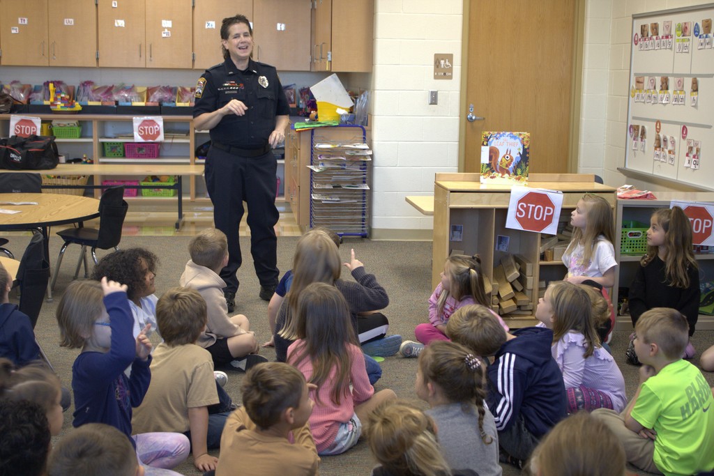 Officer Penny speaking to a class
