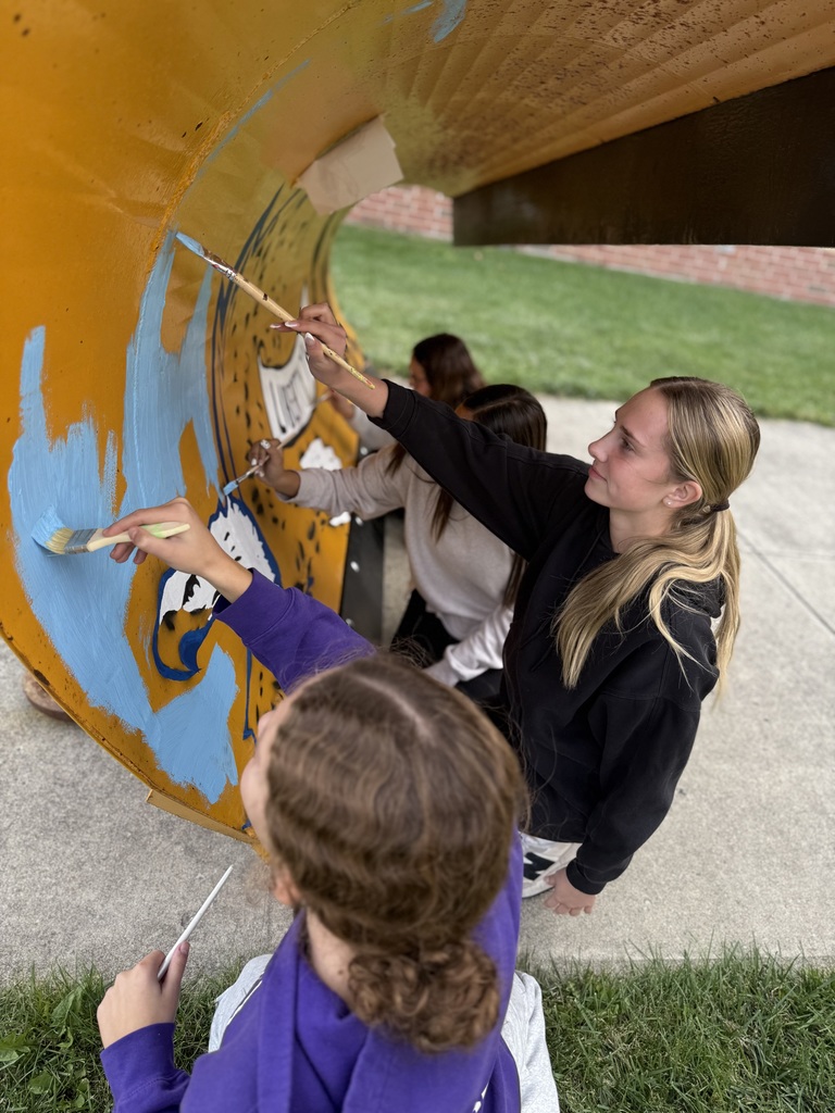 High School Art Students painting the Liberty Township plow