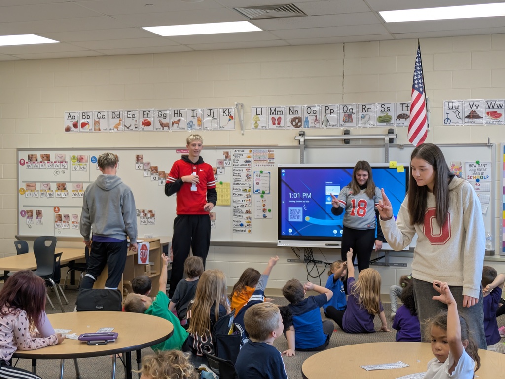 ASL Level 3 students recently visiting kindergarten classrooms