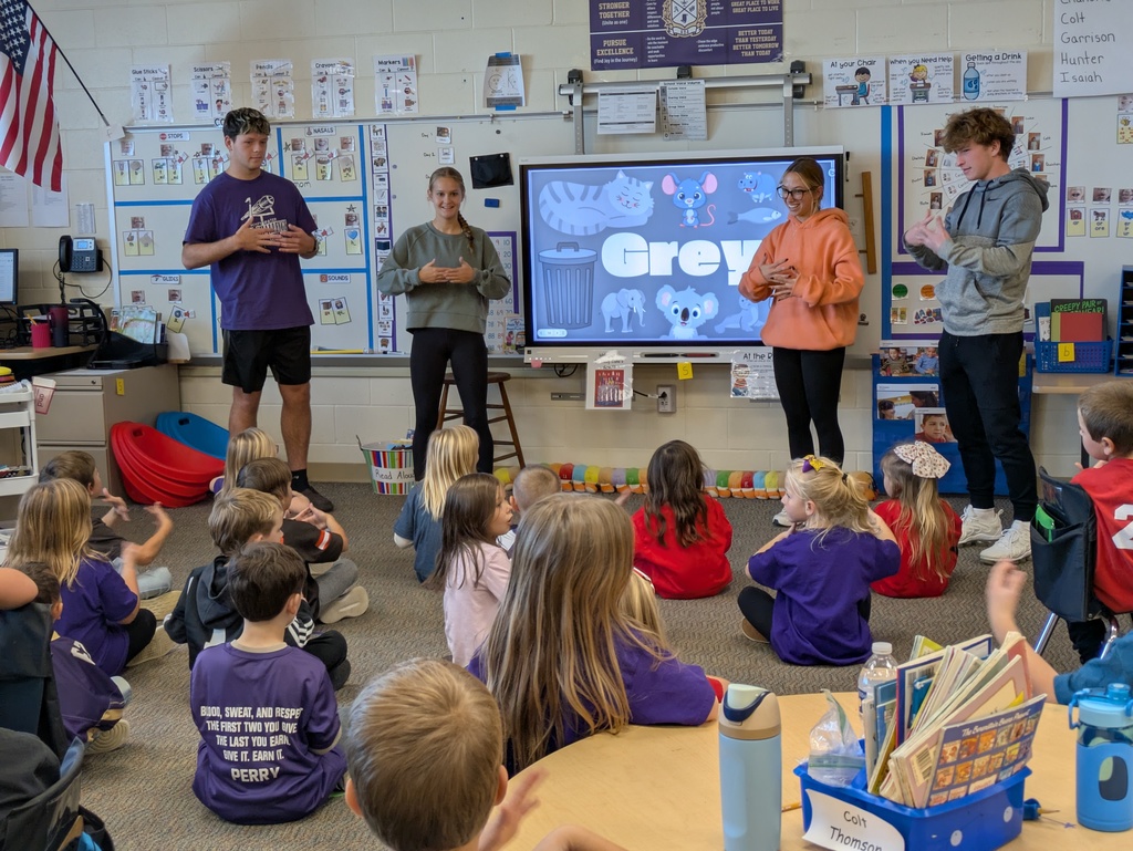 ASL Level 3 students recently visiting kindergarten classrooms