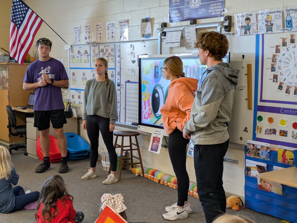 ASL Level 3 students recently visiting kindergarten classrooms