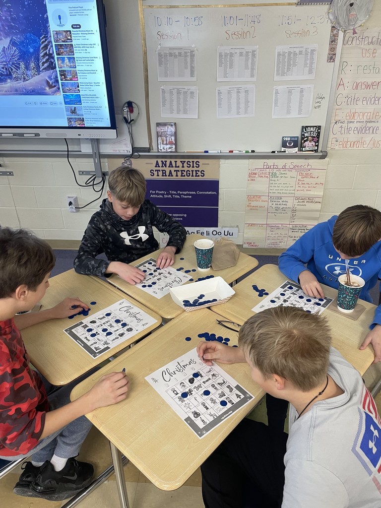 middle schoolers playing holiday bingo