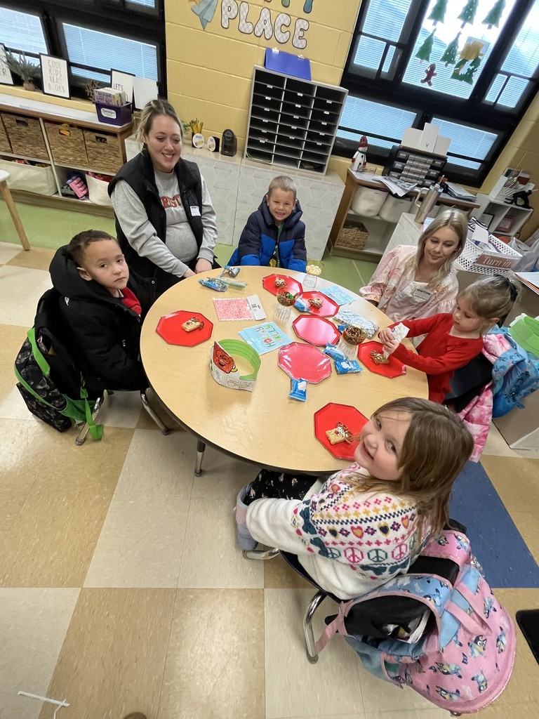 kindergarteners making holiday treats