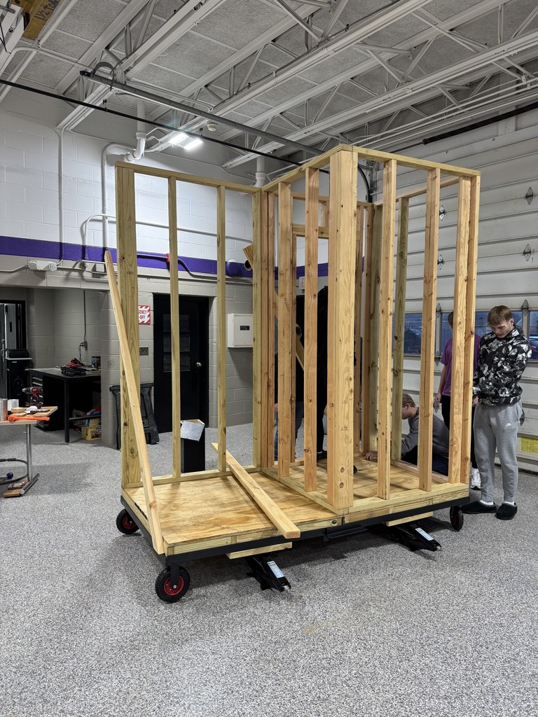 Students working on a framing project