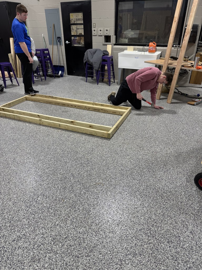 Students working on a framing project