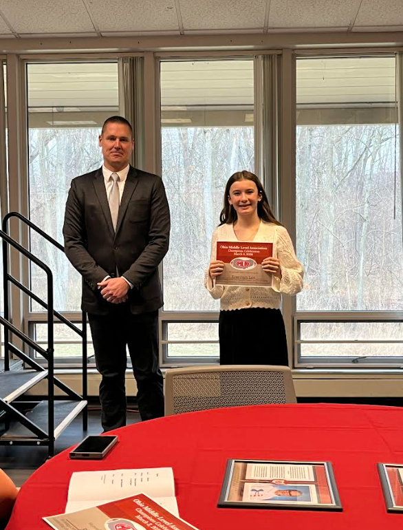 Emersyn Lee accepting the OMLA breakfast of champions