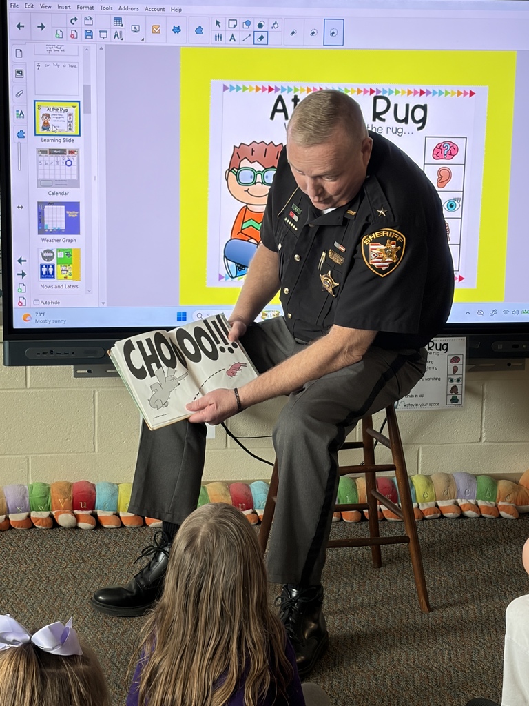 Sheriff Everhart reading to KG
