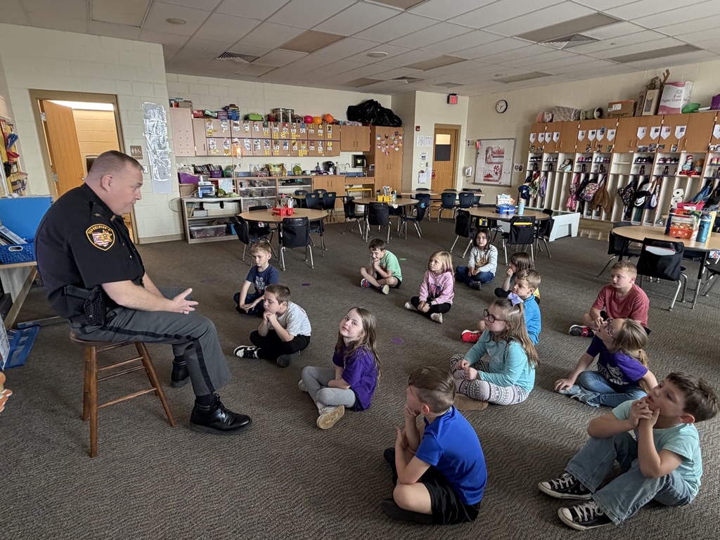Sheriff Everhart reading to KG