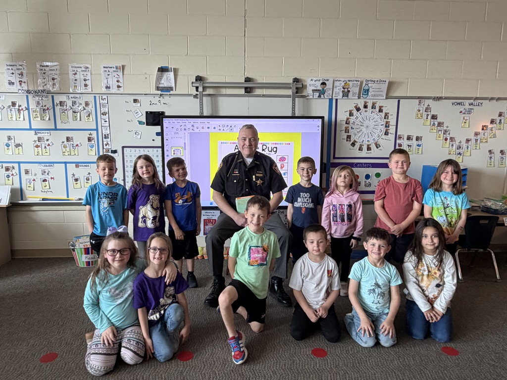 Sheriff Everhart reading to KG