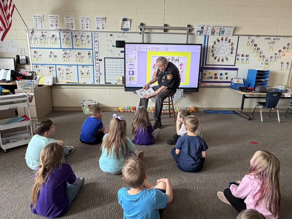 Sheriff Everhart reading to KG
