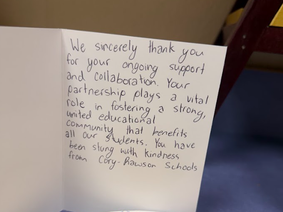 hand written thank you card on white paper