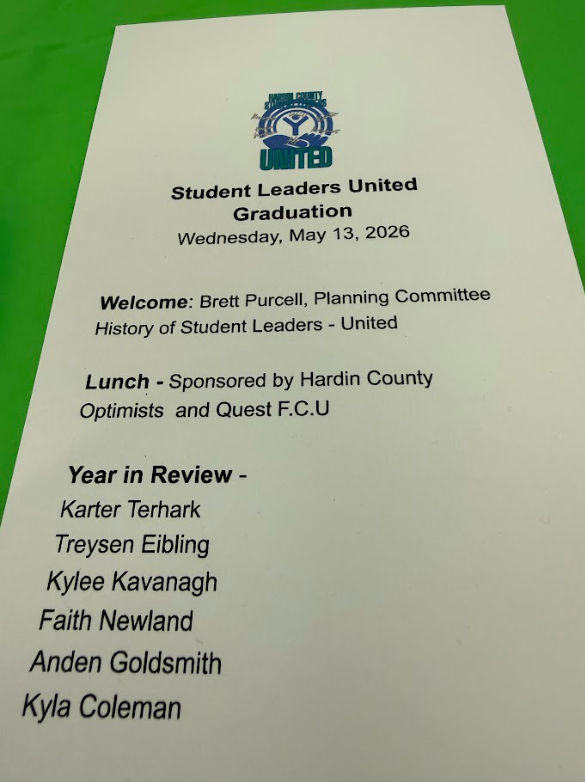 Graduation program with black text on white paper