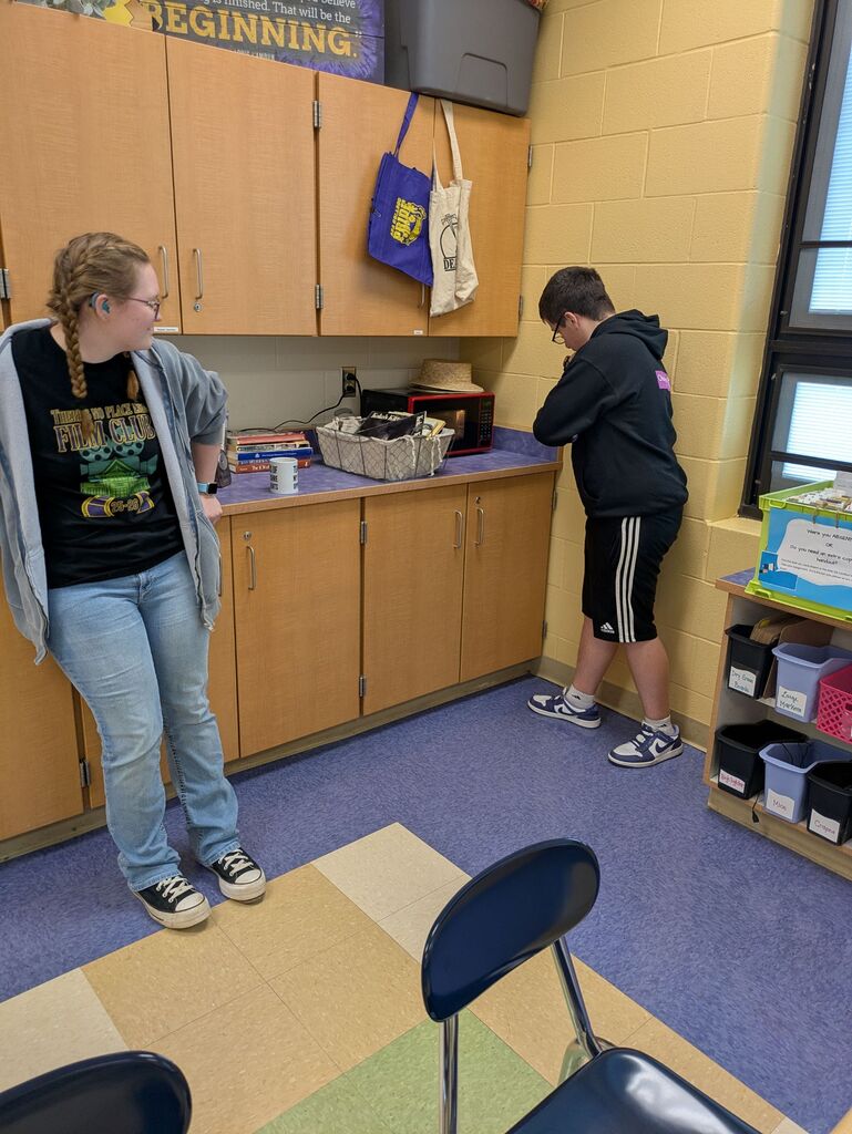 Students using a microwave