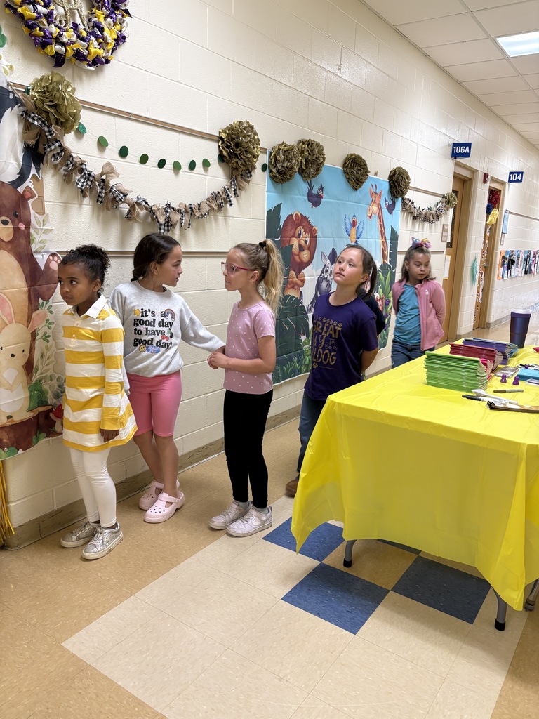 Students standing in line waiting to walk into the classroom 