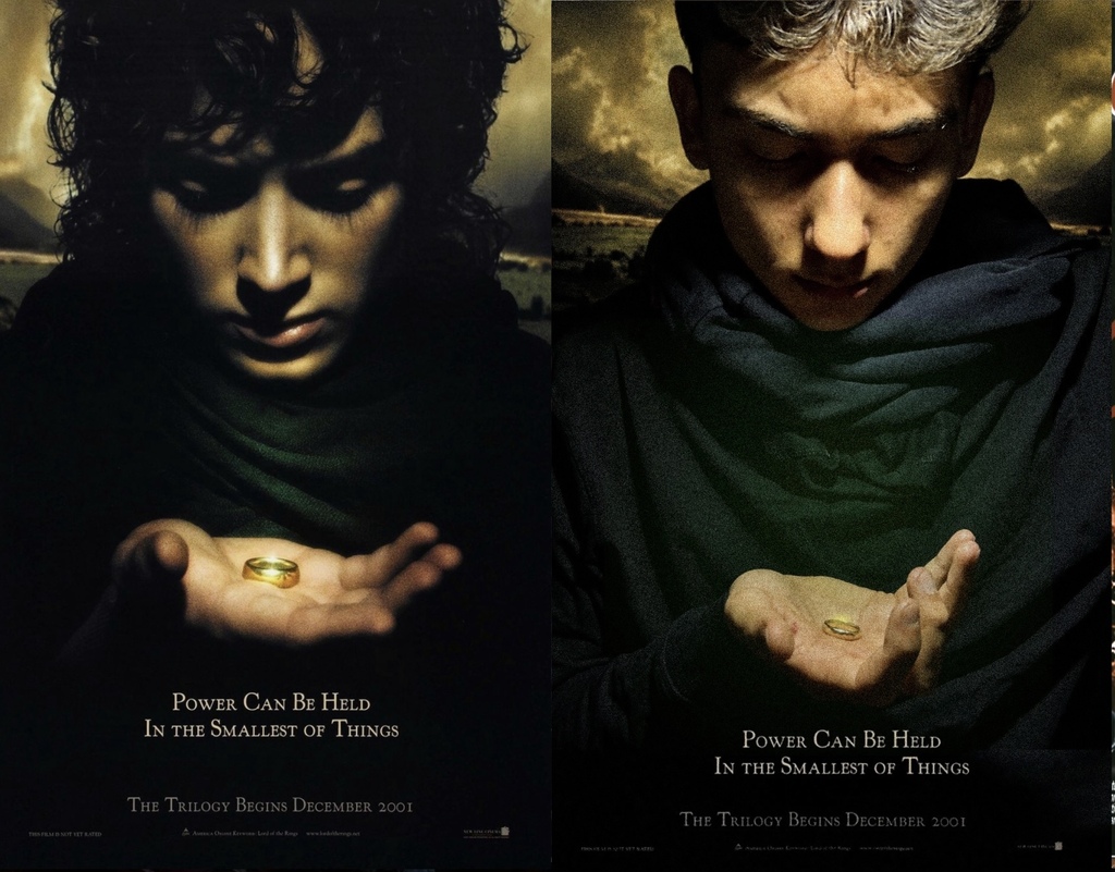 Man holding a ring in his hand staring down at it 