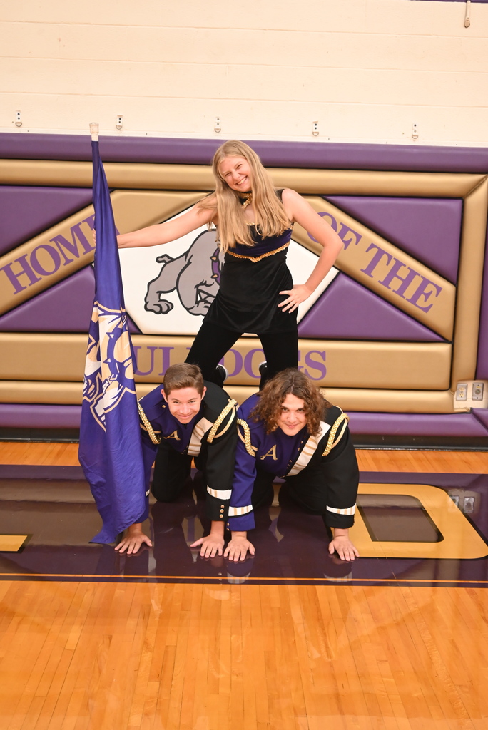 Three students in a pyramid 