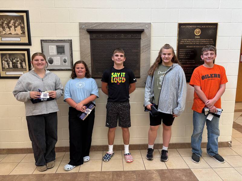 Five studnets facing the camera