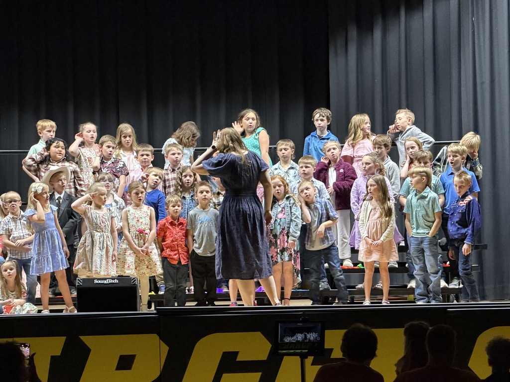 1st & 2nd graders singing