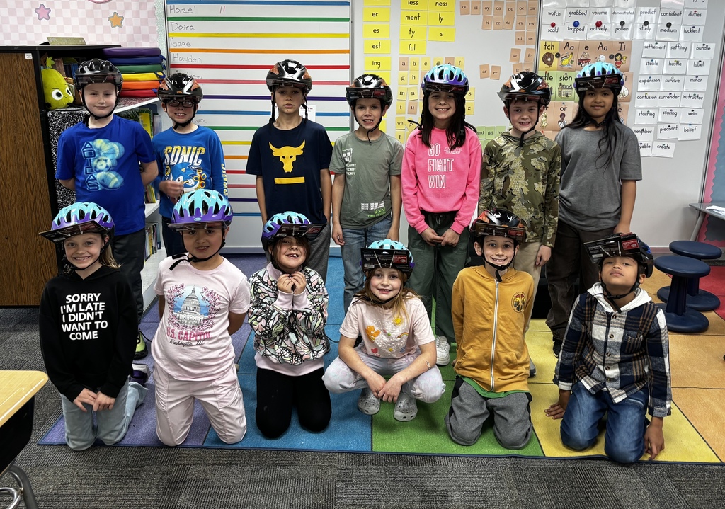 Students with bike helmets