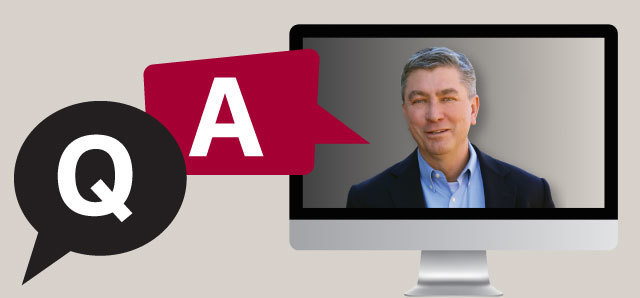 The words Q&A with a photo of the Superintendent on a computer screen