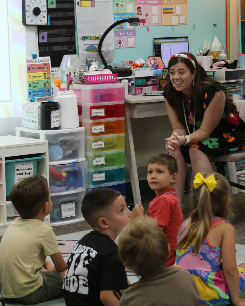 Kinder teacher with students in classroom
