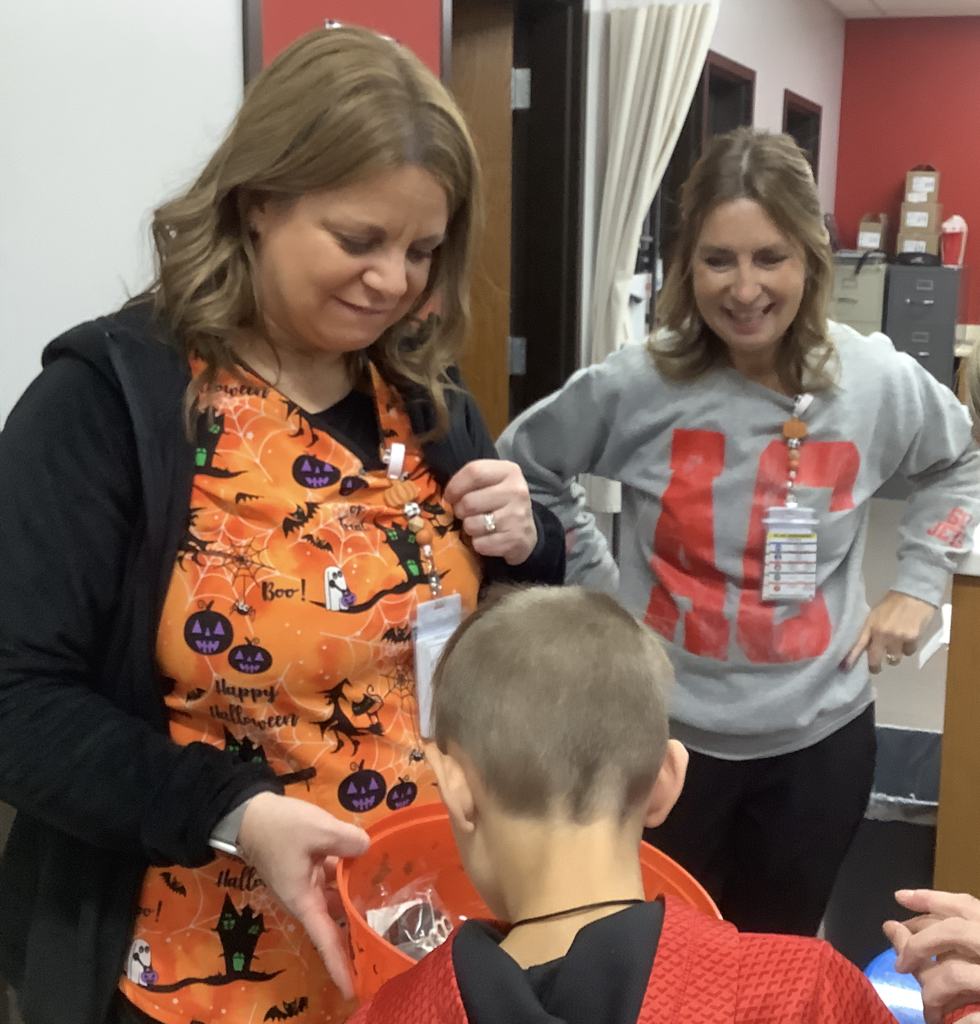 Miss Pett's class had fun today practicing trick-or-treating. 