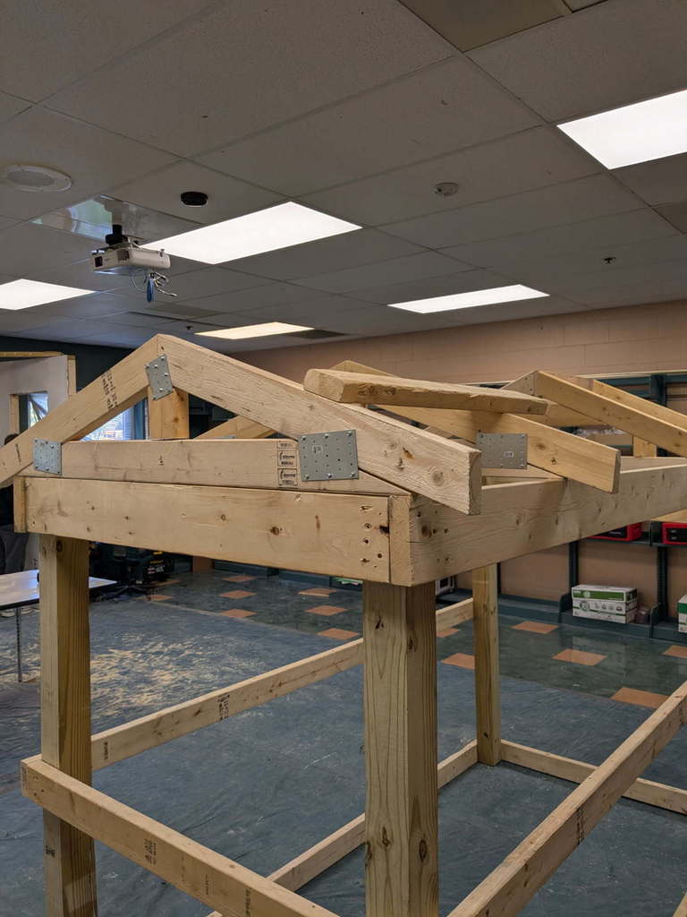 Pole barn with trusses that the fixer upper class constructed