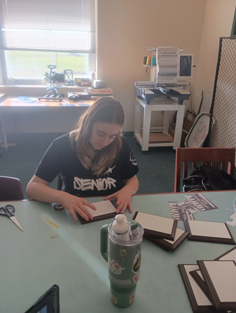 Precisely taping designs to the plaques