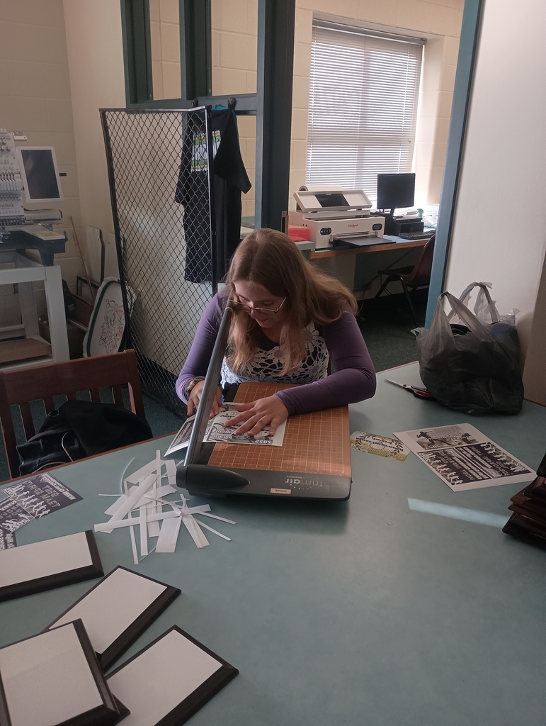 Prepping the designs by cutting them to the appropriate size