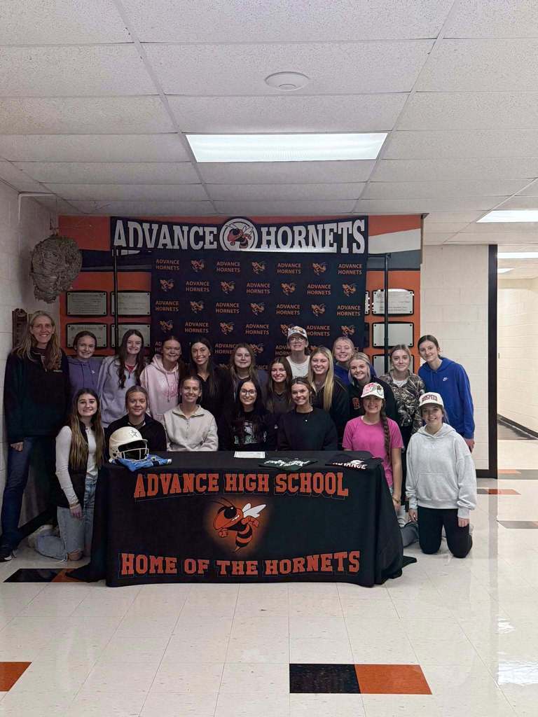 Brogan Hawkins and the volleyball team as she signs with Central Methodist University.