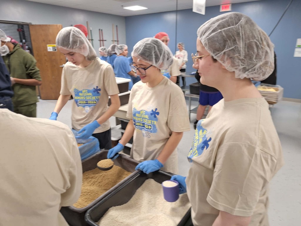 three students working 