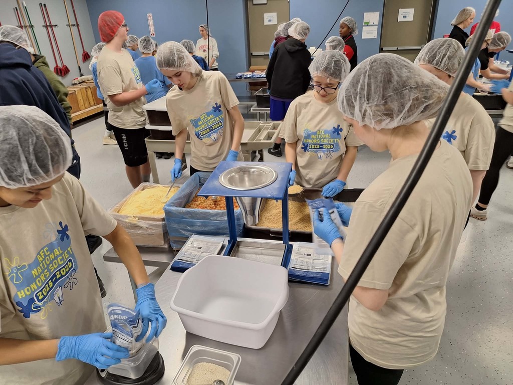 group of students measuring and sorting