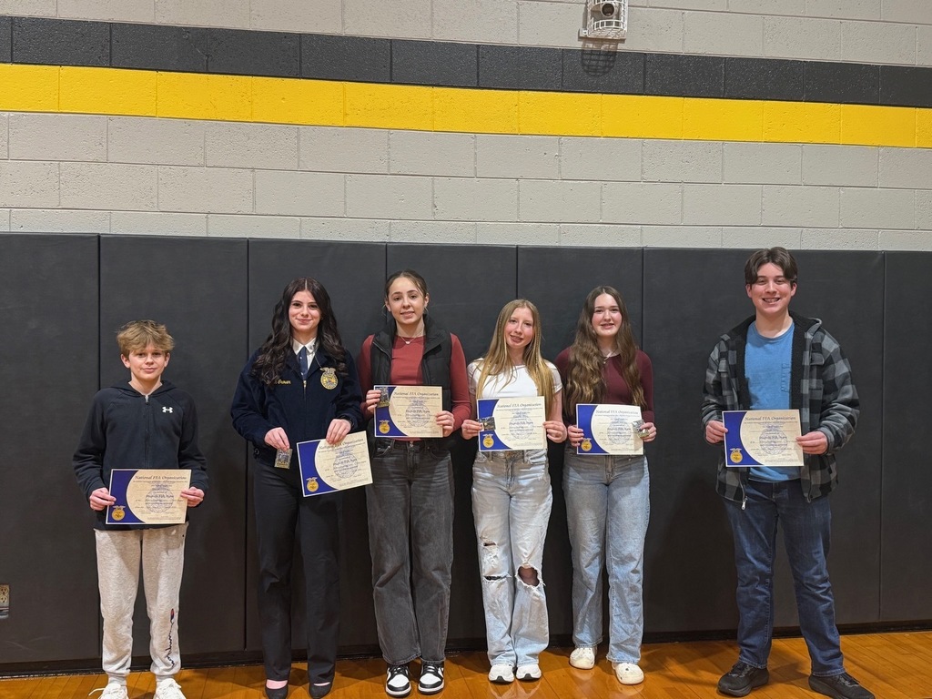 Six students holding certificate