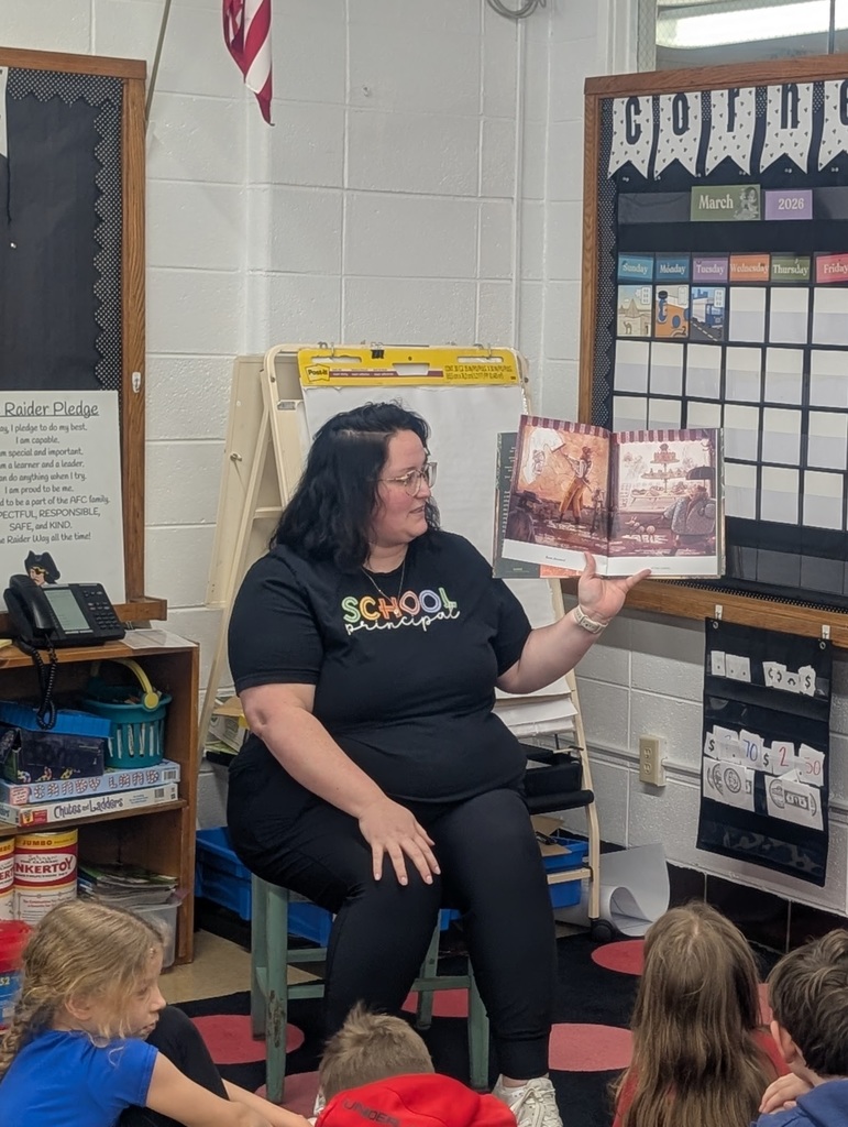 Teacher reading to students