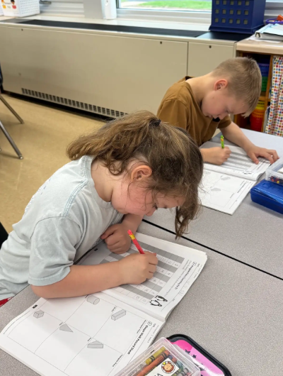 student working in workbook