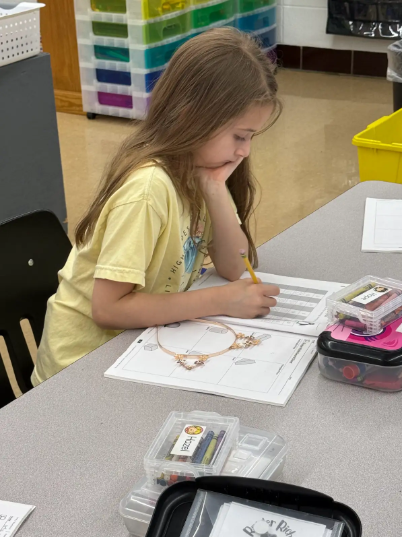 student working in workbook