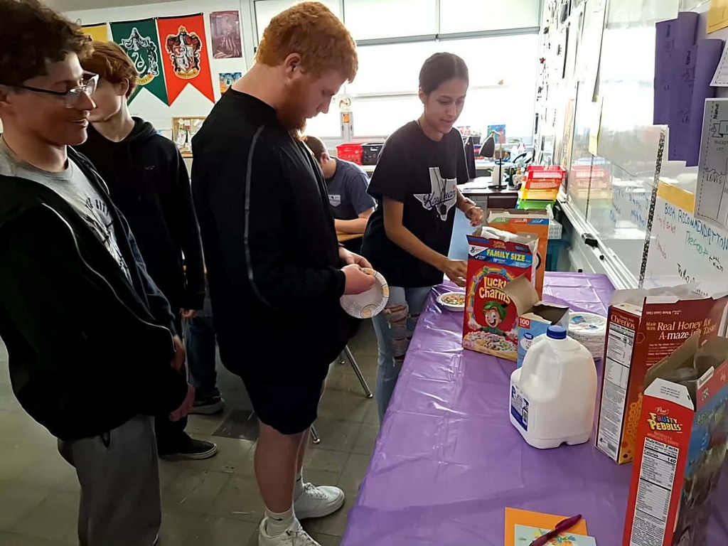 students at the cereal line