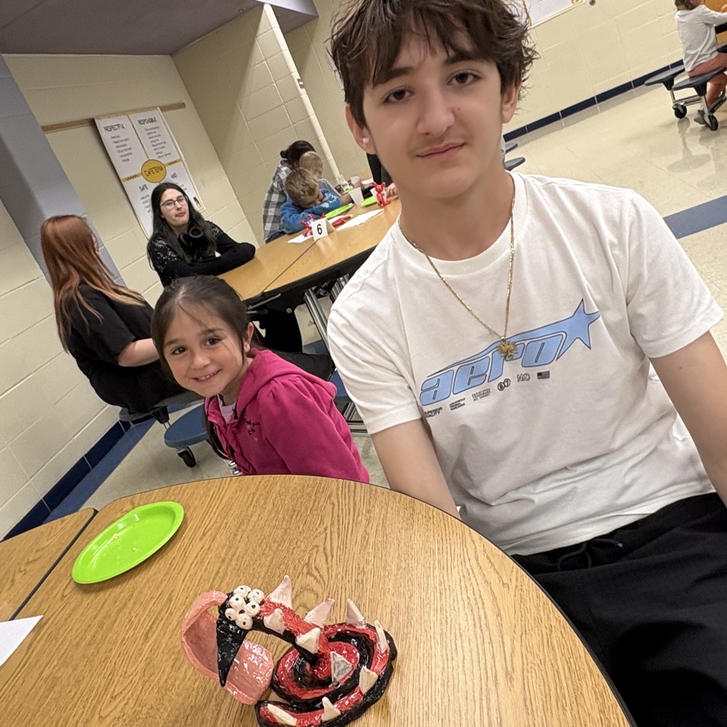students posing with their 3d monster