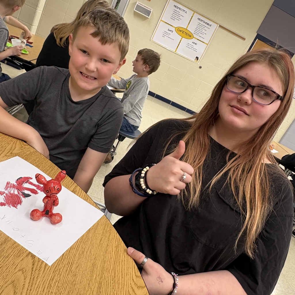 students posing with their 3d monster