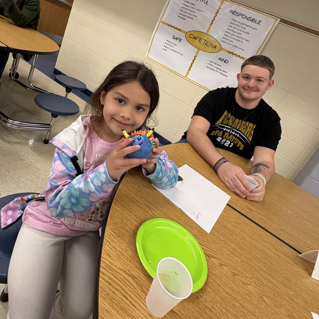 students posing with their 3d monster