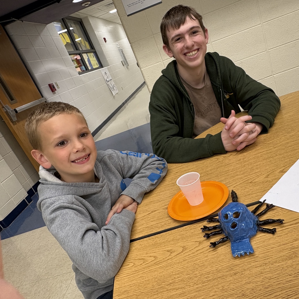 students posing with their 3d monster